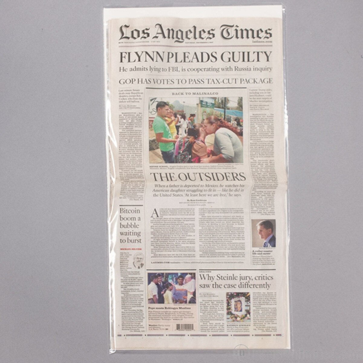 Newspaper Sleeve. Holds current-day